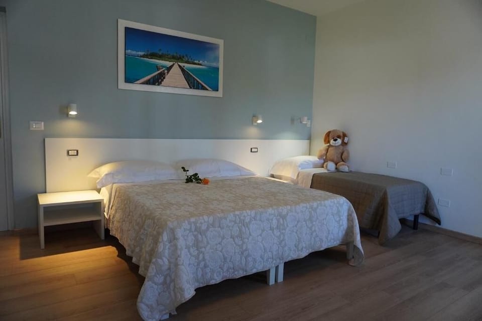 Triple Room, Private Bathroom | Desk, laptop workspace, free WiFi