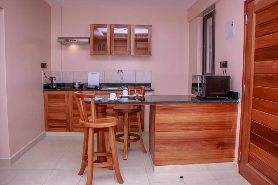 Mini-fridge, microwave, stovetop