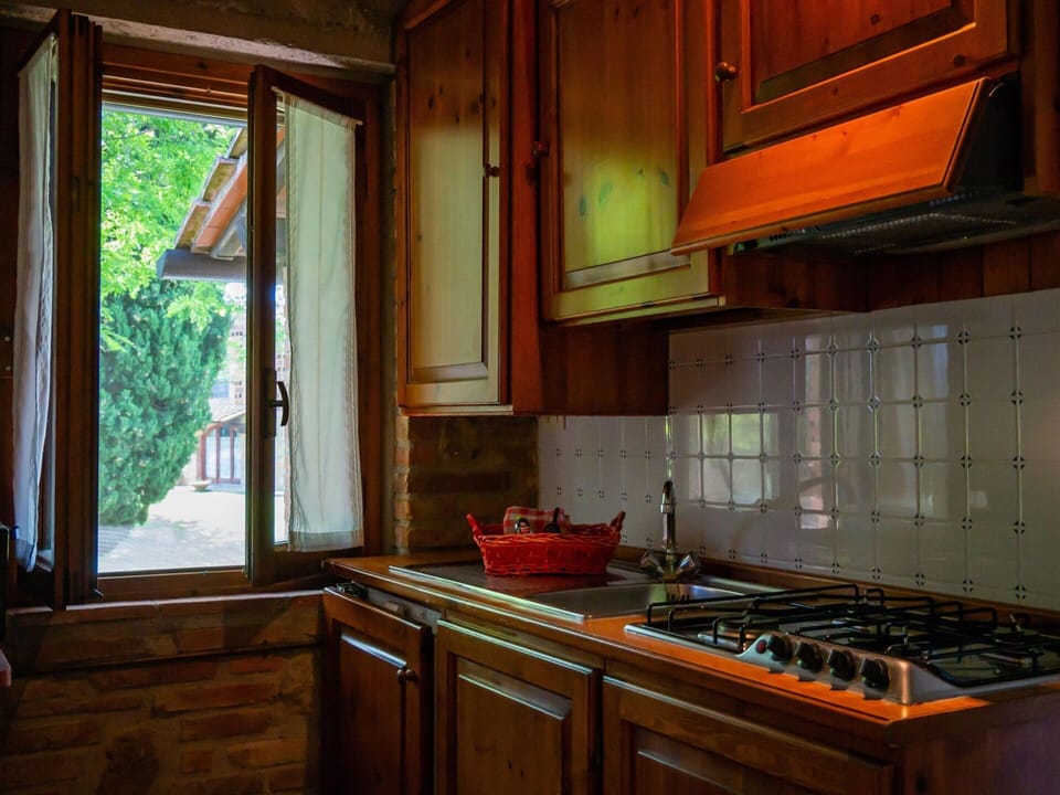 Apartment | Private kitchen | Stovetop, highchair