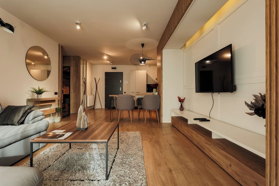 Business Apartment, Balcony, Garden View | Living area | Flat-screen TV