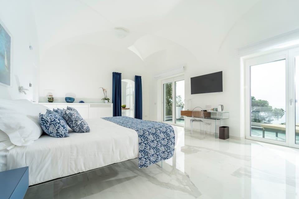 Luxury Suite, 1 King Bed, Terrace, Sea View | Premium bedding, Select Comfort beds, minibar, in-room safe