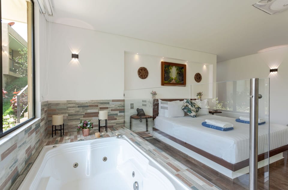 Deluxe Suite, 1 Double Bed, Balcony | In-room safe, blackout drapes, free WiFi