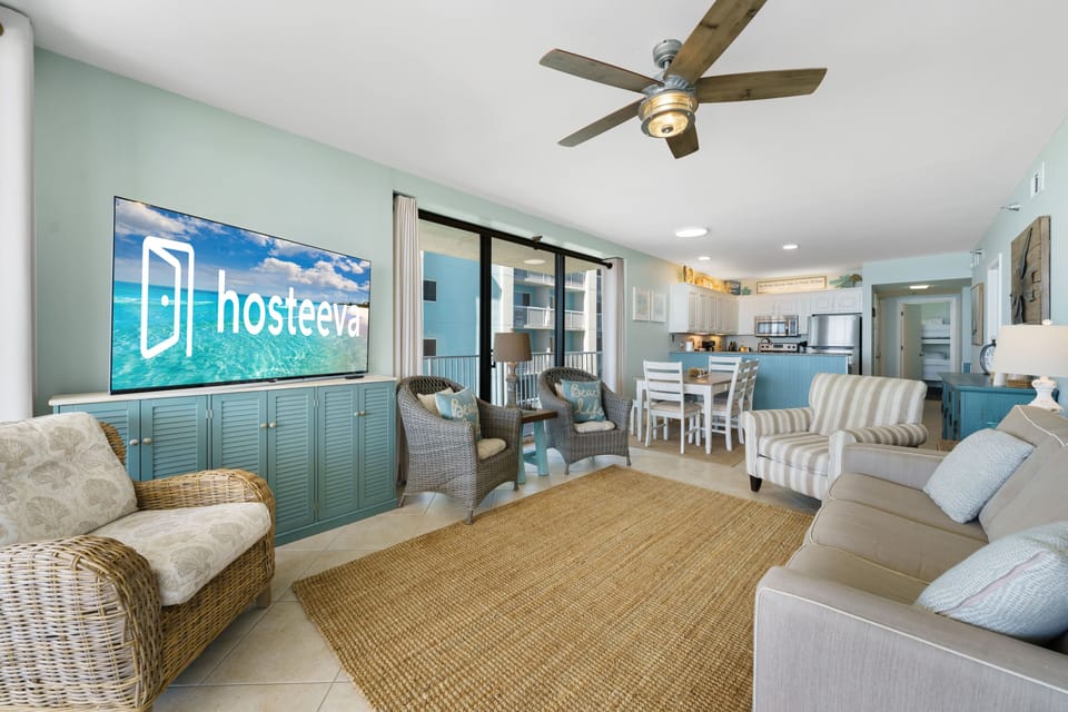 Signature Condo, 3 Bedrooms, Balcony, Beach View | Living room | 50-inch Smart TV with cable channels