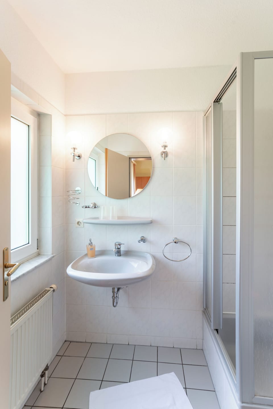 Shower, towels, toilet paper
