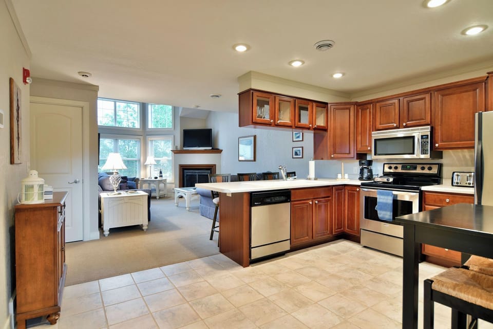 Condo, Multiple Beds, Fireplace, Golf View (Unit 207 2 BDRM/ 2 BA) | Private kitchen | Coffee/tea maker