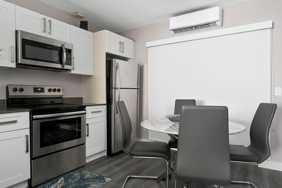 Classic Apartment, Partial Ocean View | Private kitchen | Full-size fridge, microwave, oven, stovetop