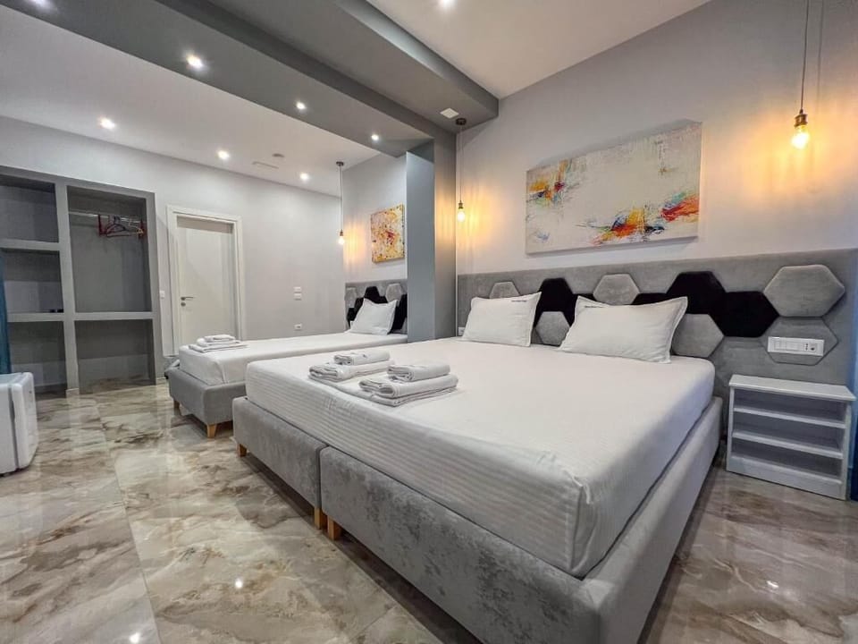 Triple Room, Balcony, Sea View | Desk, free WiFi, bed sheets