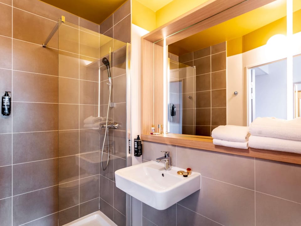 Blackout drapes, soundproofing, iron/ironing board