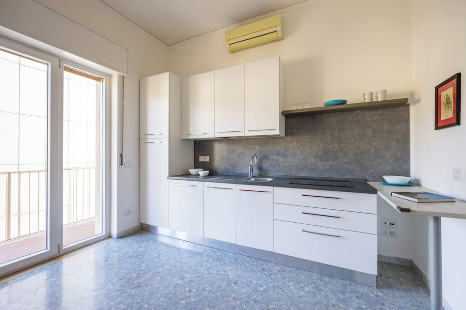 City Apartment, Balcony | Living area | 32-inch LCD TV with digital channels