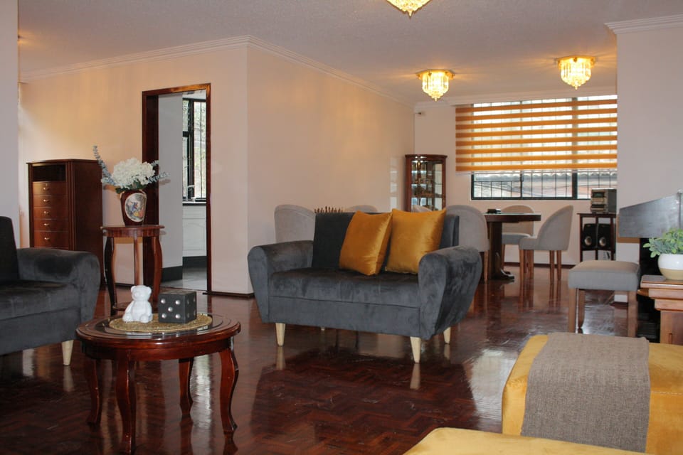 Deluxe Apartment, 3 Bedrooms, City View | Living area | 32-inch LED TV with cable channels, Netflix, streaming services