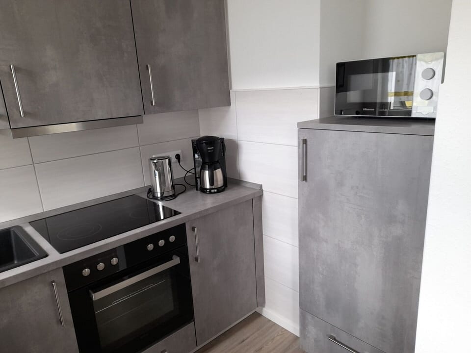 Apartment | Private kitchen | Electric kettle, toaster, highchair