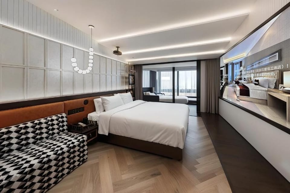 Premium bedding, down comforters, memory foam beds, minibar (free items)