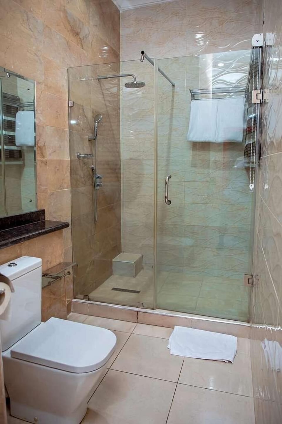 Bathtub, free toiletries, slippers, towels