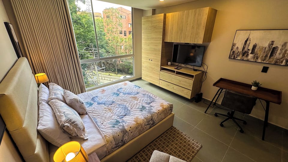 Comfort Apartment | 1 bedroom, in-room safe, blackout drapes, iron/ironing board