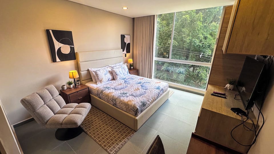 Comfort Apartment | 1 bedroom, in-room safe, blackout drapes, iron/ironing board