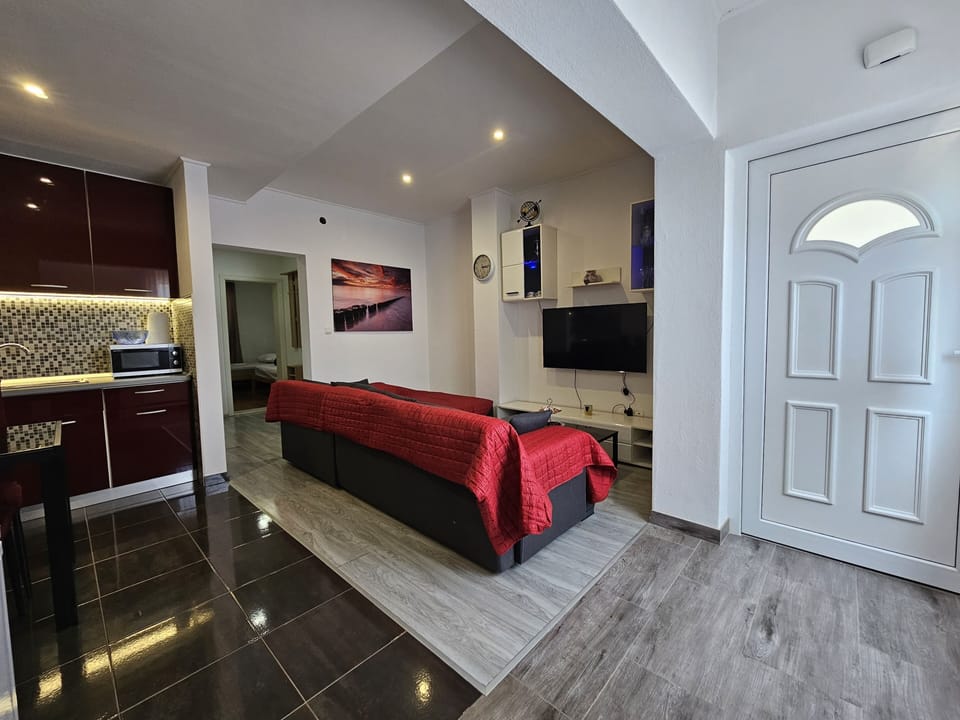 Comfort Apartment, 2 Bedrooms, Non Smoking, Kitchen | Living area | 55-inch Smart TV with cable channels