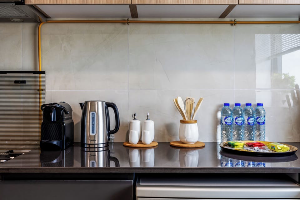 Comfort Apartment, Balcony | Private kitchen | Fridge, microwave, oven, stovetop