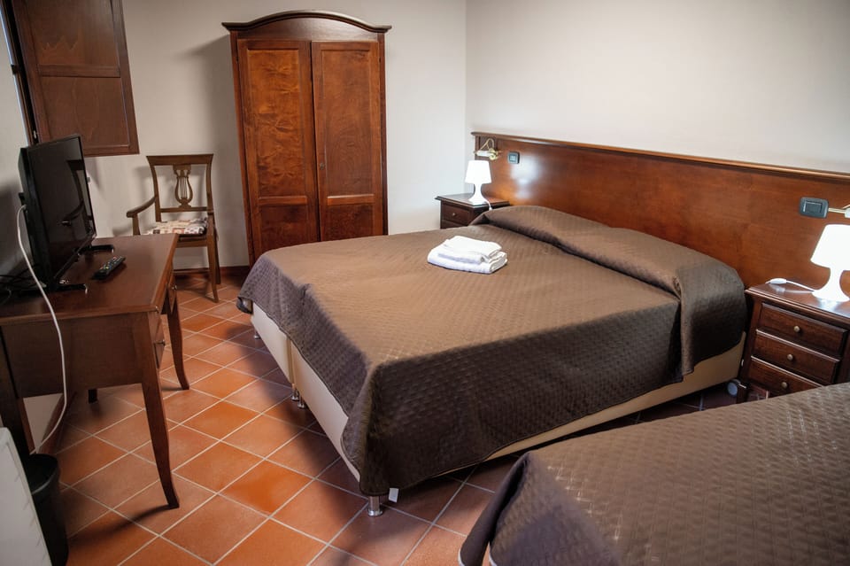 Basic Quadruple Room, Mountain View | In-room safe, desk, laptop workspace, soundproofing