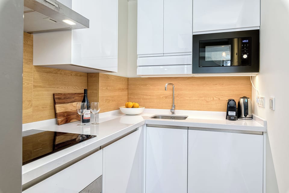 Superior Apartment, 2 Bedrooms, City View | Private kitchen | Coffee/tea maker, electric kettle, toaster, highchair
