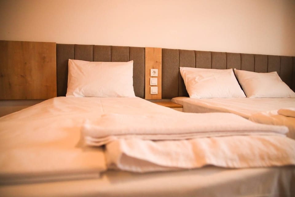 Family Triple Room, Balcony, Lake View | Desk, free WiFi