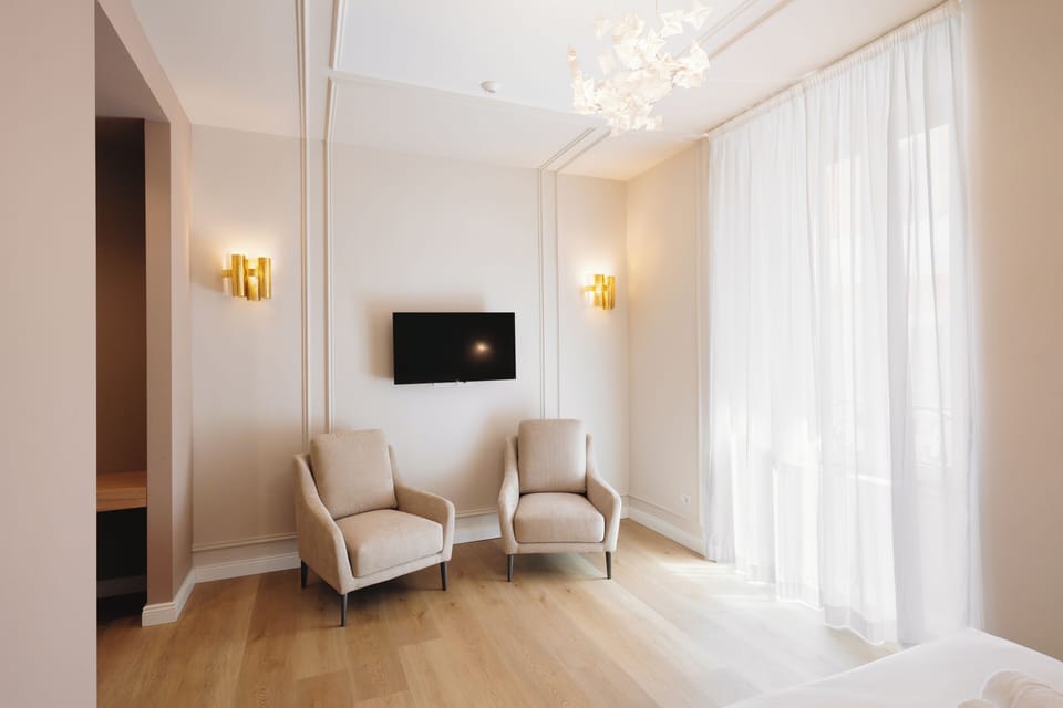 Junior Double Room, City View | Living area | 40-inch TV with satellite channels, Netflix, streaming services