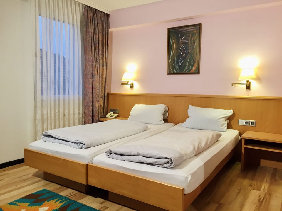 Pillowtop beds, individually furnished, desk, free WiFi