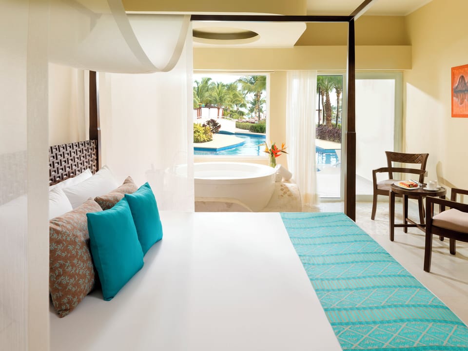 Premium bedding, down comforters, free minibar, in-room safe
