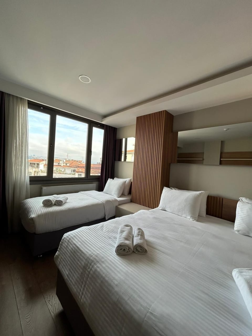 Family Triple Room | Laptop workspace, WiFi (free), bed sheets