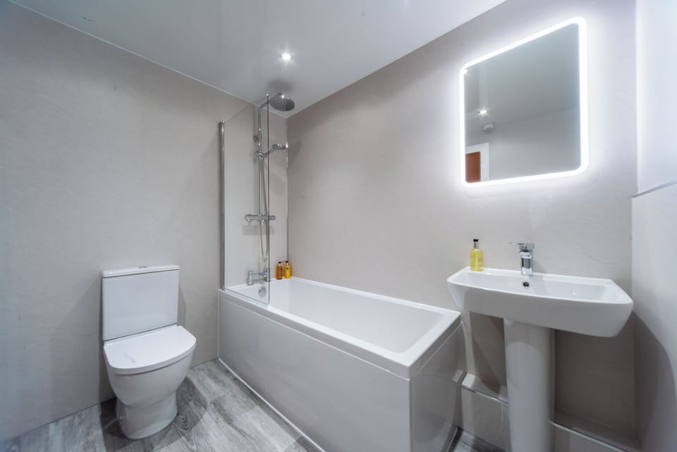 Hair dryer, towels, soap, shampoo