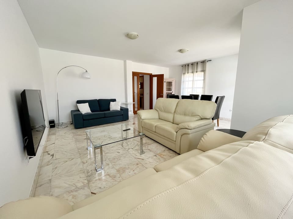 Villa | Living area | TV, fireplace