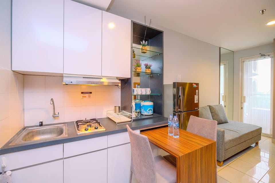 Apartment | Private kitchen | Fridge, stovetop, rice cooker, dining tables