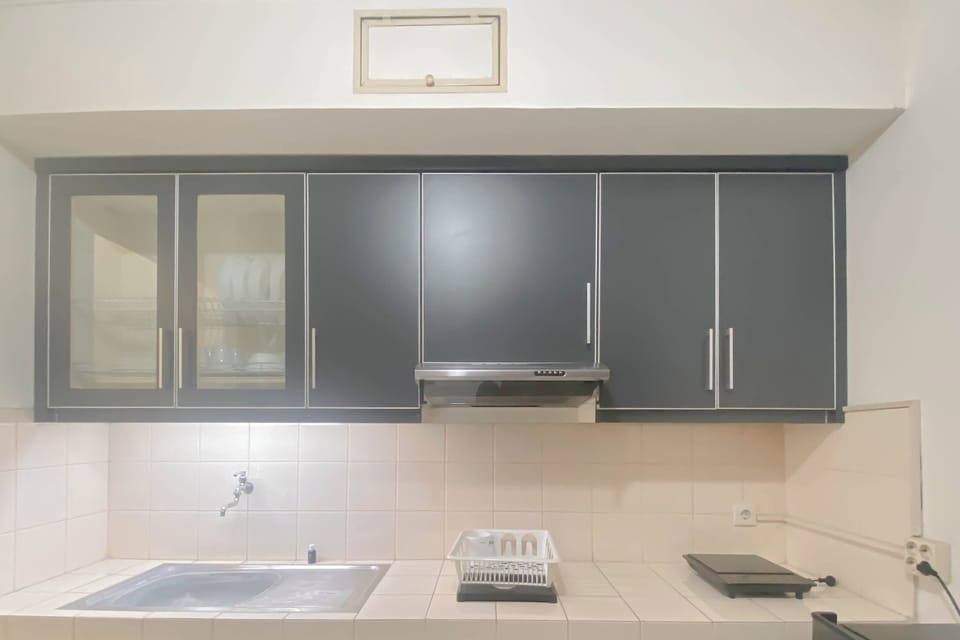 Apartment | Private kitchen | Fridge, stovetop, rice cooker, dining tables