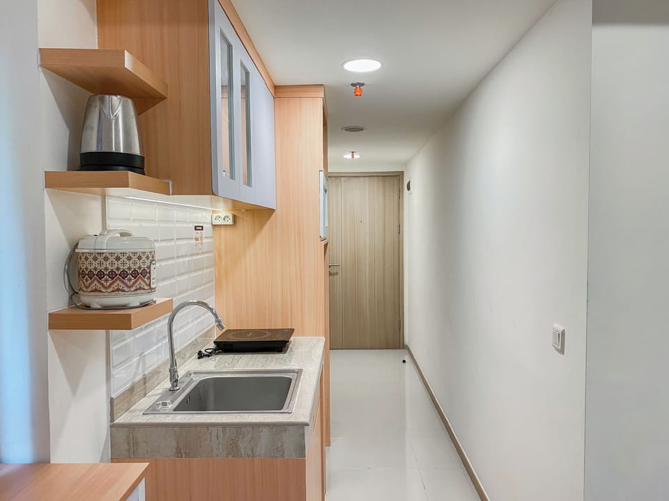 Apartment | Private kitchen | Fridge, stovetop, rice cooker, dining tables