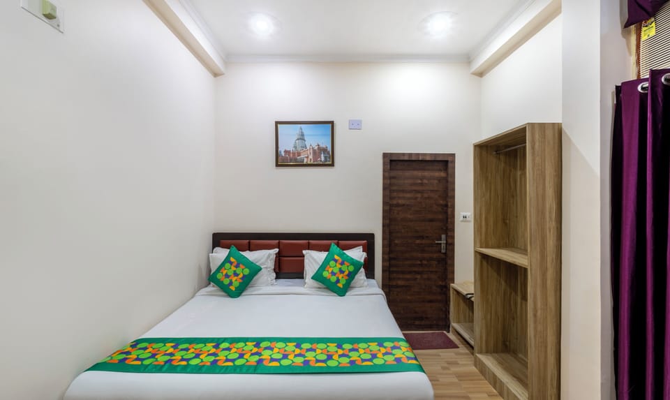 Economy Room | Individually furnished, desk, blackout drapes, iron/ironing board