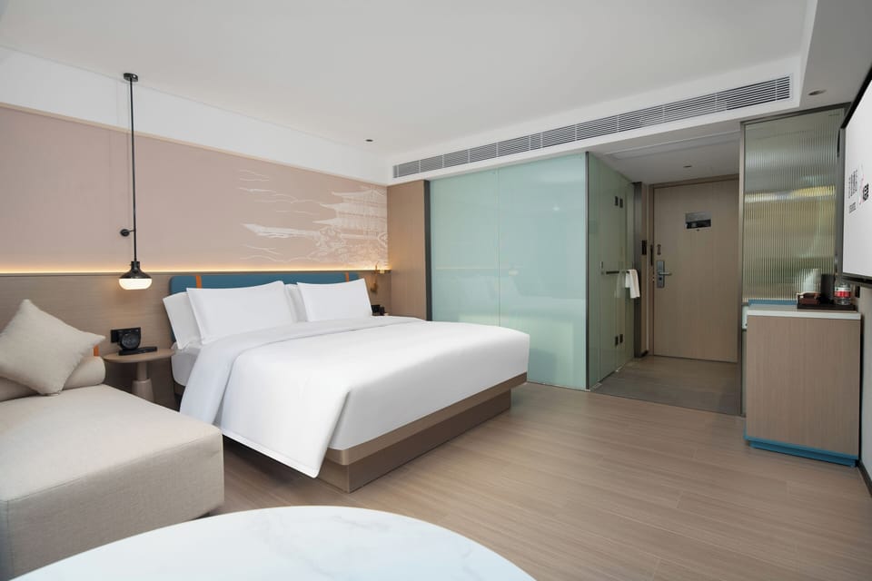 Deluxe King Room | Premium bedding, down comforters, desk, blackout drapes