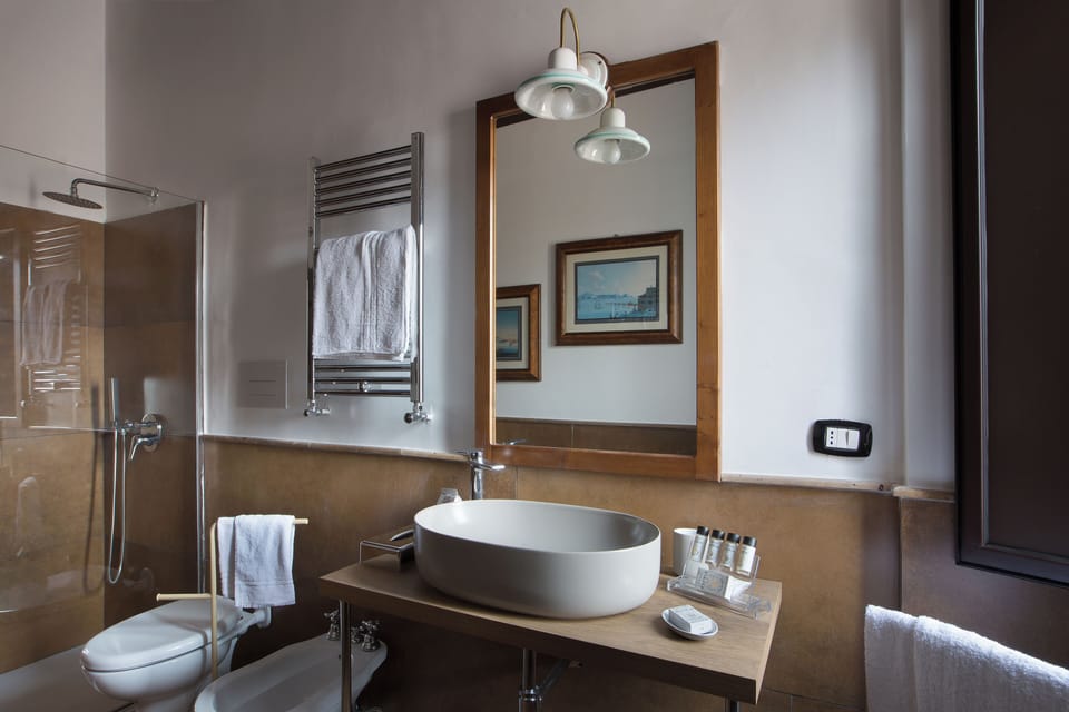 Basic Room, 1 Queen Bed, Garden View, Garden Area | Bathroom | Shower, free toiletries, hair dryer, towels