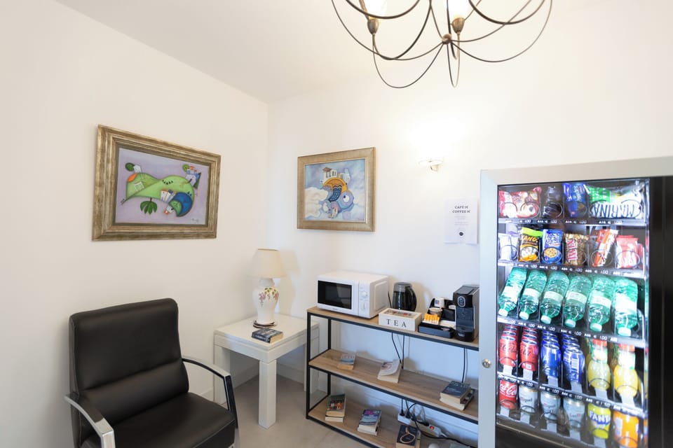 Comfort Triple Room | Living area | 32-inch LCD TV with digital channels