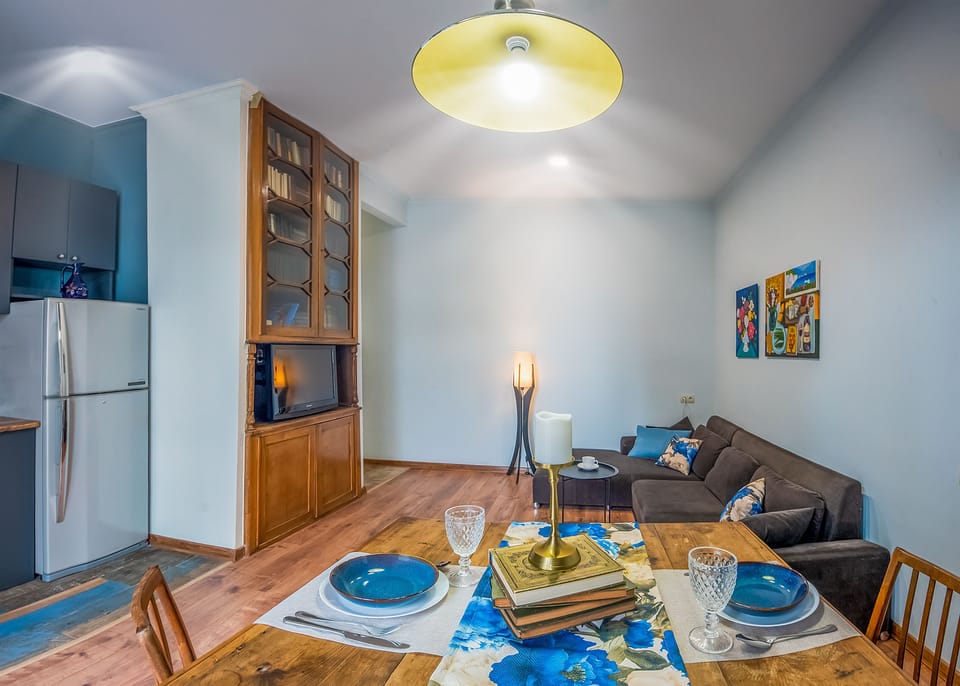Apartment, Balcony, City View | Living area | 37-inch flat-screen TV with digital channels