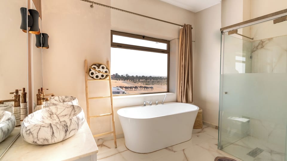 Suite, Balcony, Park View | Bathroom | Shower, toilet paper