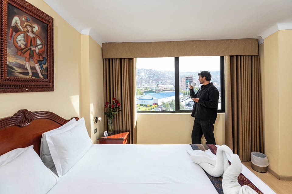 Double Room | Minibar, in-room safe, desk, blackout drapes