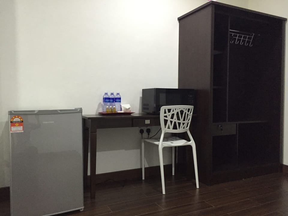 Family Quadruple Room, 2 Queen Beds, Mountain View | Minibar, desk, laptop workspace, iron/ironing board