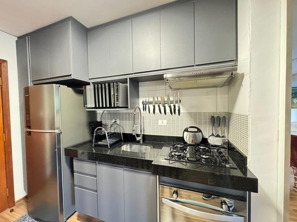 Luxury Apartment, Balcony, City View | Private kitchen | Microwave, oven, stovetop, espresso maker