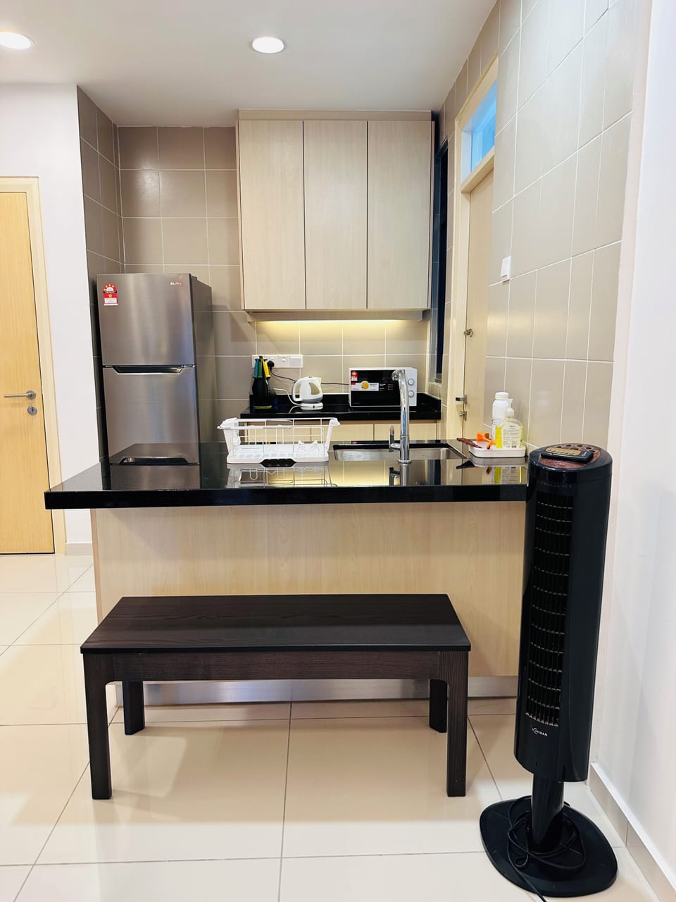 Signature Apartment, City View | Private kitchen | Full-size fridge, microwave, stovetop, electric kettle