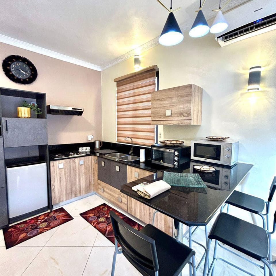 Deluxe Apartment, Balcony, Pool View | Private kitchen