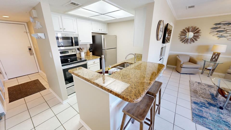 Condo, 1 Bedroom | Private kitchen | Coffee/tea maker, fridge, oven, stovetop