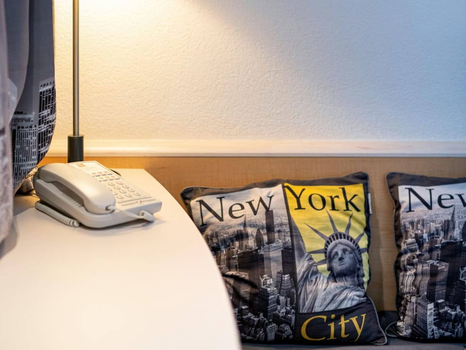 Desk, blackout drapes, soundproofing, iron/ironing board (on request)