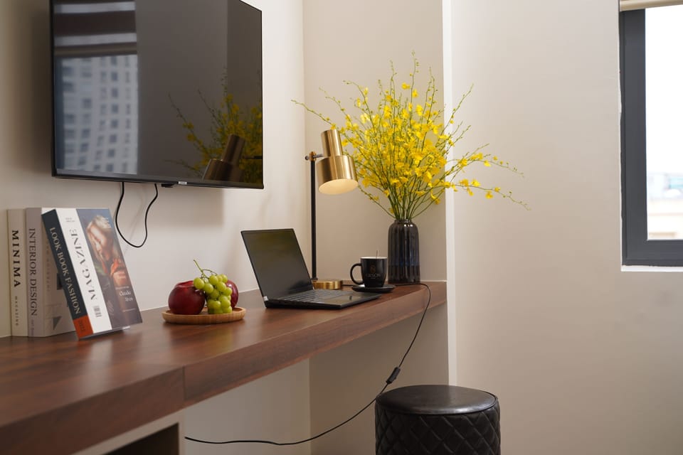 Deluxe Room, Non Smoking, City View | Minibar, in-room safe, desk, laptop workspace