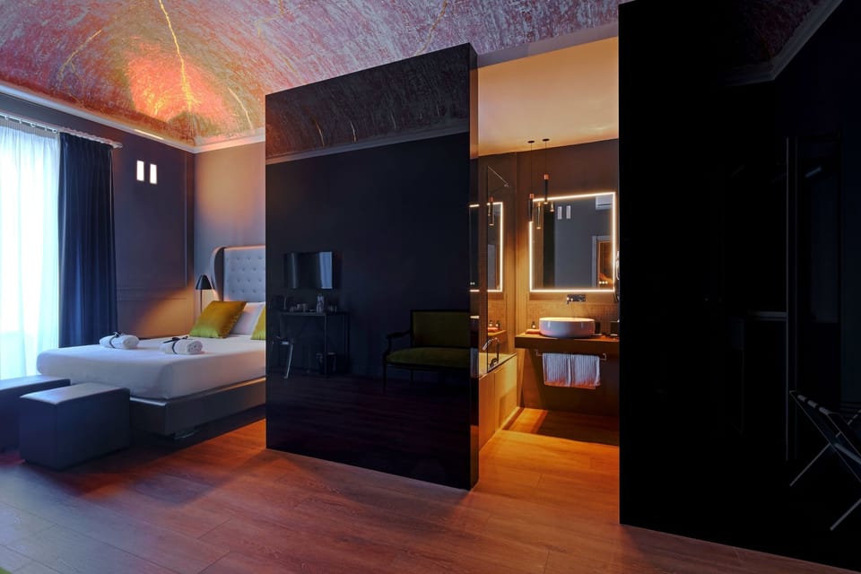 Junior Suite, Balcony, City View | Minibar, in-room safe, desk, blackout drapes
