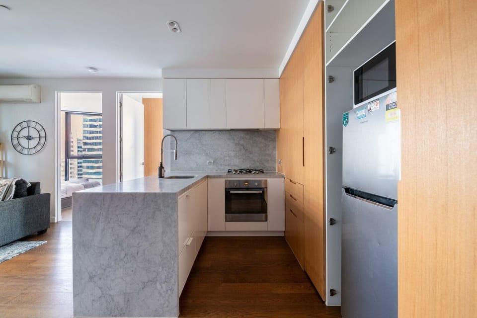 Apartment, Balcony, City View | Private kitchen | Full-size fridge, microwave, oven, stovetop