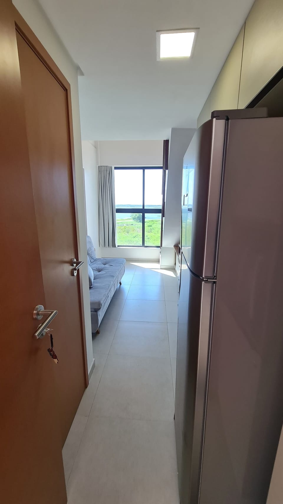 Comfort Duplex, Lagoon View | Private kitchen | Fridge, microwave, stovetop, cookware/dishes/utensils